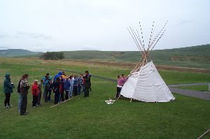 Putting up a Tipi at Nez Perce cultural center